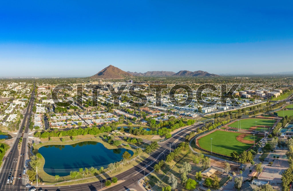 Aerial view of Scottsdale, Arizona at sunrise with urban and natural landscapes