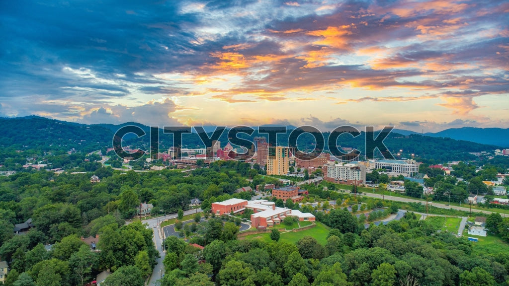 Sunset view over Asheville, NC with mountains and cityscape