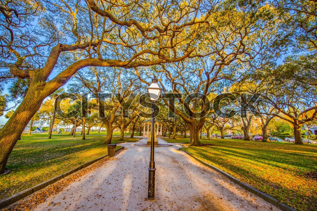 Scenic sunset view of White Point Garden pathway in Charleston