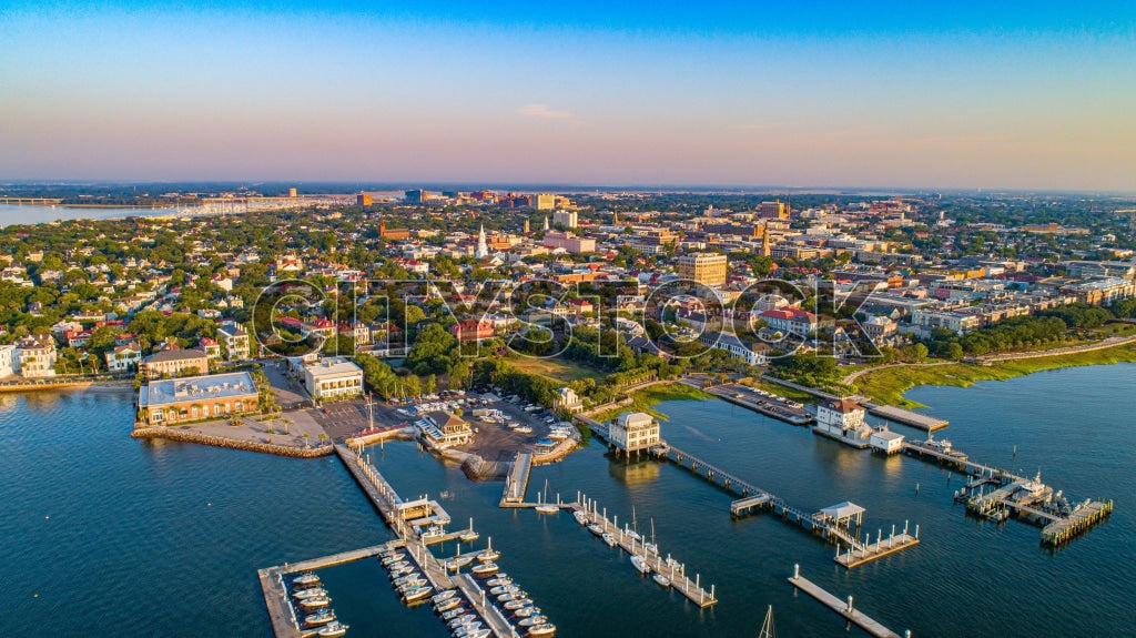 Aerial view of Charleston SC waterfront and cityscape at golden hour