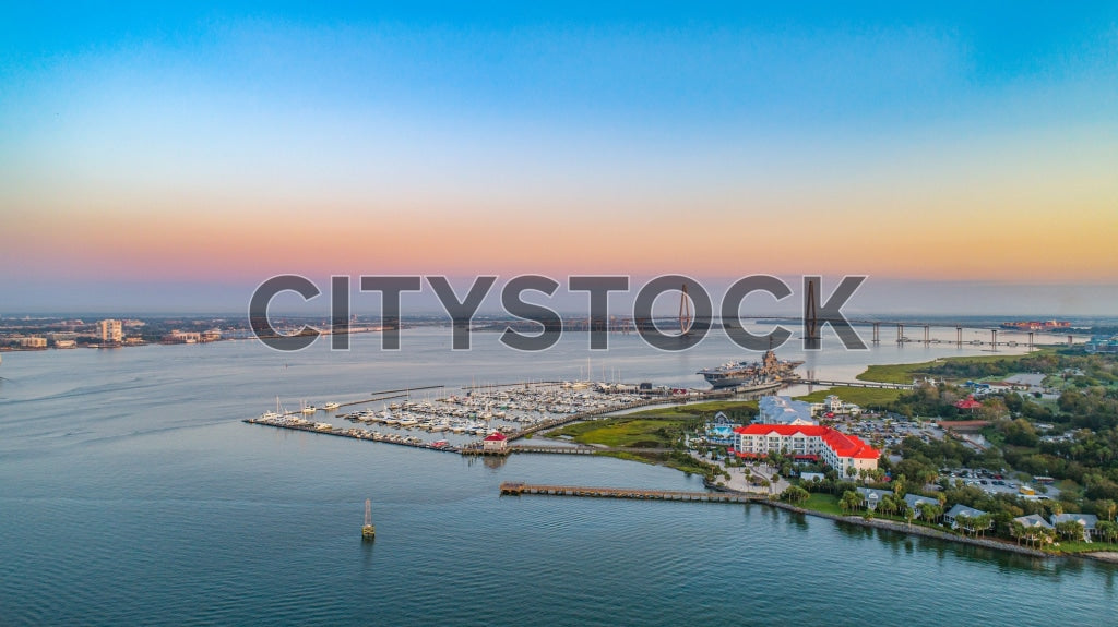 Aerial view of Charleston Marina and Arthur Ravenel Jr. Bridge at sunset