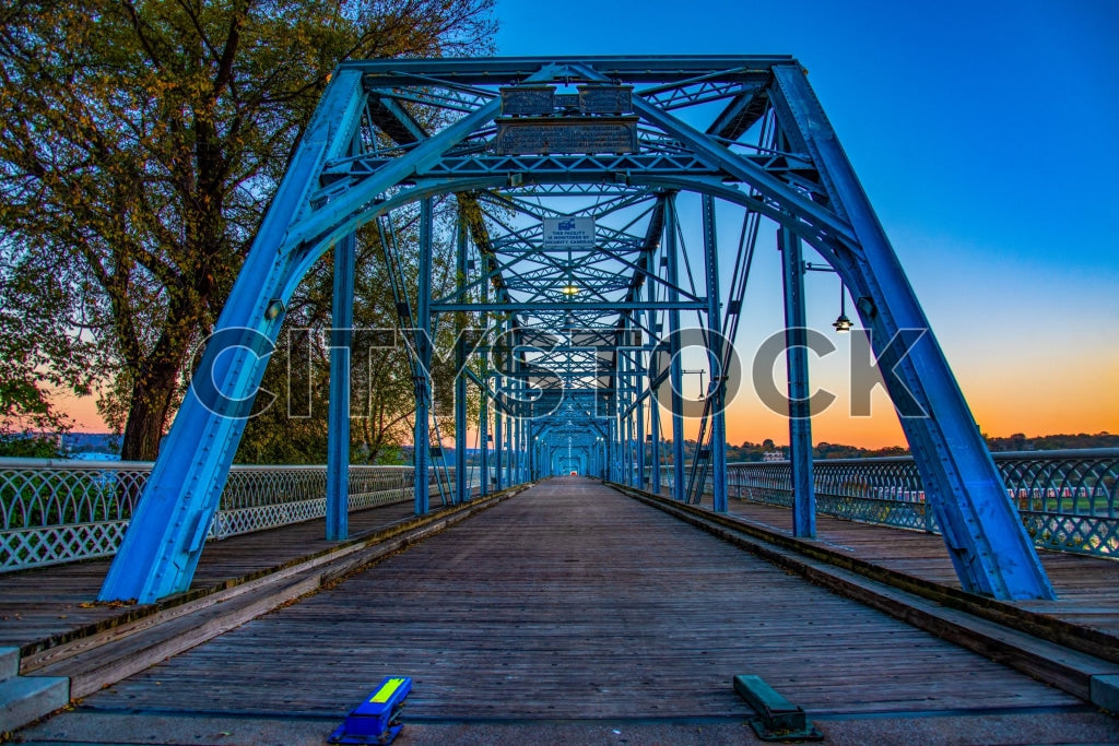 Historic blue bridge in Chattanooga, Tennessee at sunset