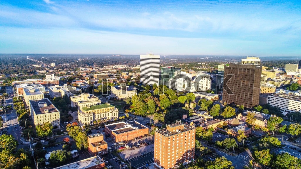 Aerial cityscape view of Columbia, South Carolina under blue skies