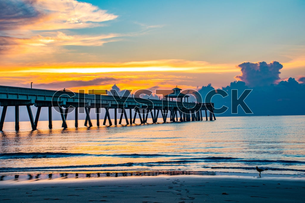 Sunrise at Deerfield Beach Pier, Florida, with Dramatic Cloudy Sky