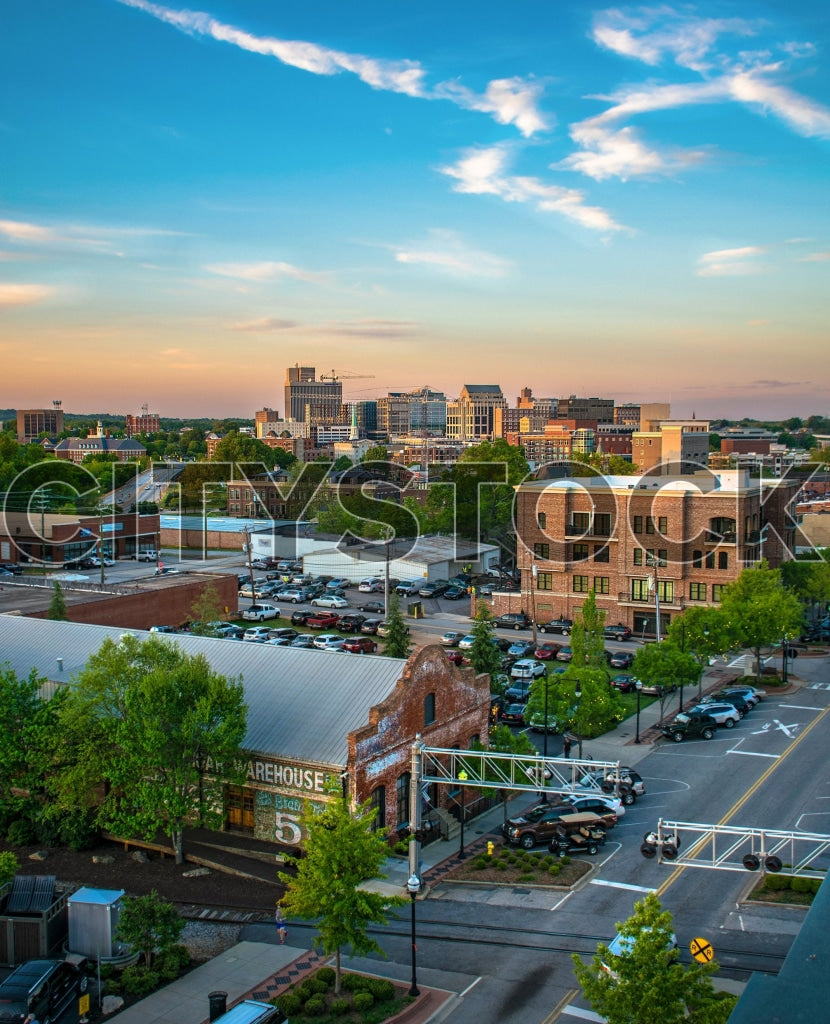 Aerial view of Greenville downtown skyline at sunset with vibrant skies