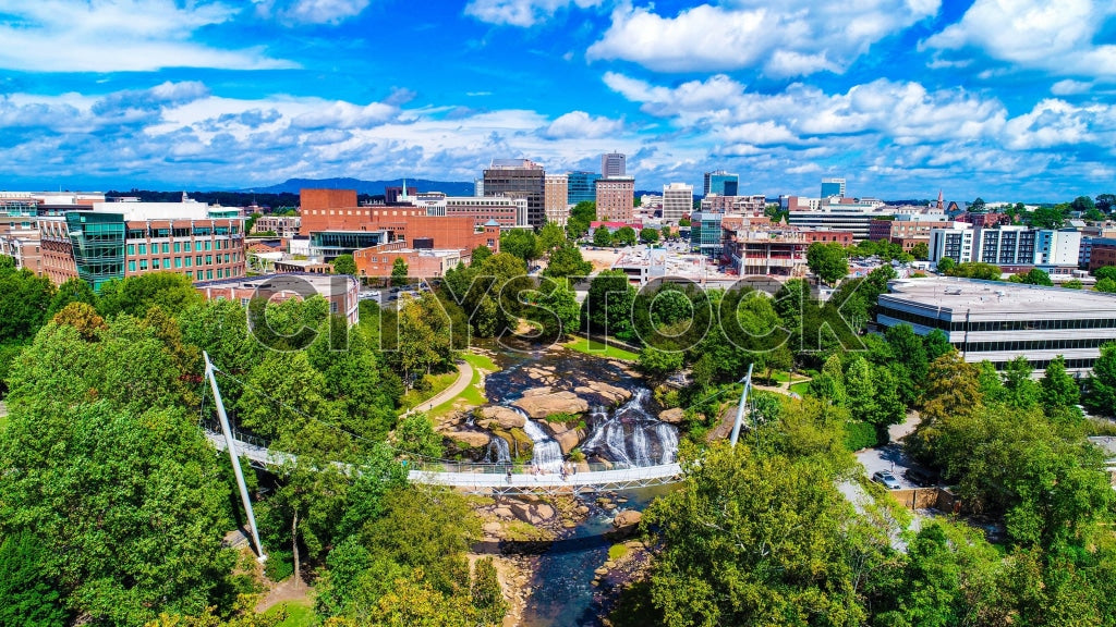 Aerial view of Greenville, SC showcasing urban park and cityscape