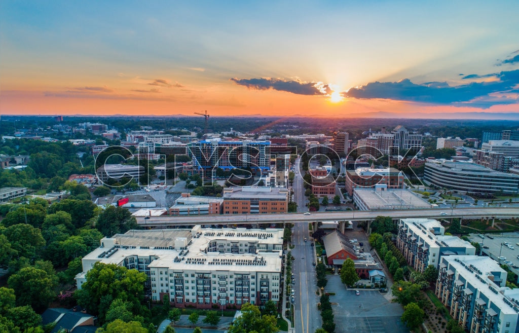 Aerial sunset view over Greenville, SC showcasing cityscape