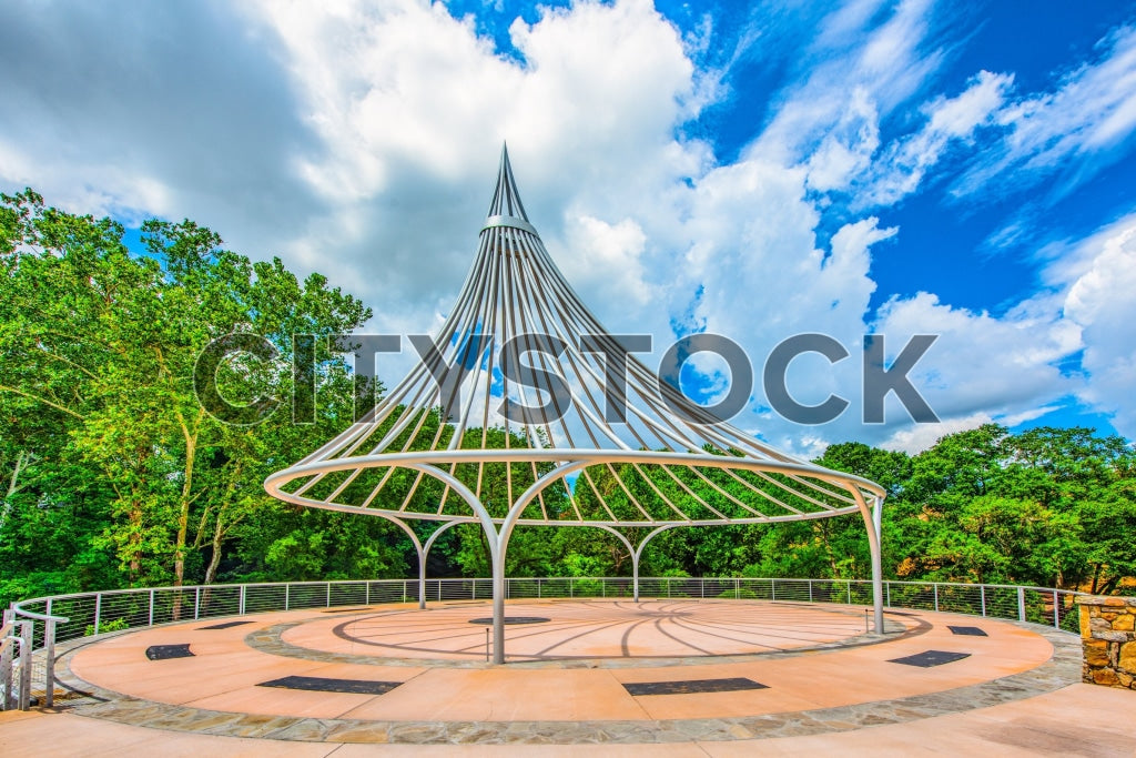 Modern pavilion in Greenville, SC with blue sky and green trees