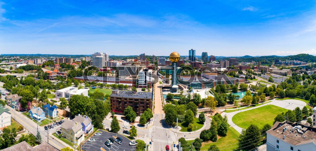 Aerial view of Knoxville, TN showing buildings, roads, and green spaces