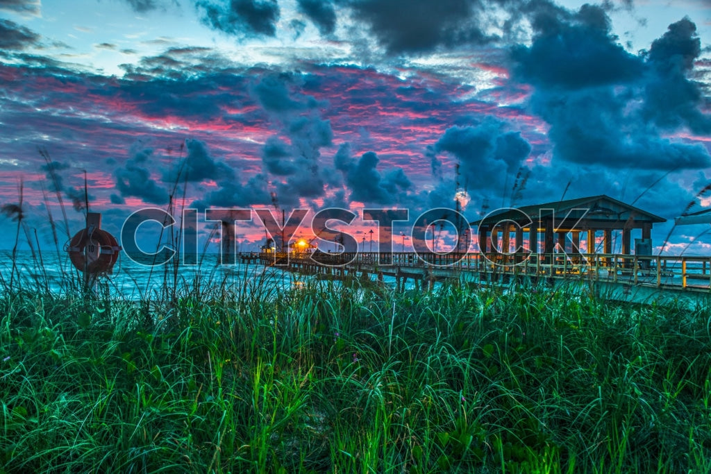 Dramatic sunset at Lauderdale pier with vibrant skies