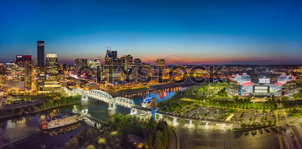 Aerial sunset view of Nashville skyline with Cumberland River