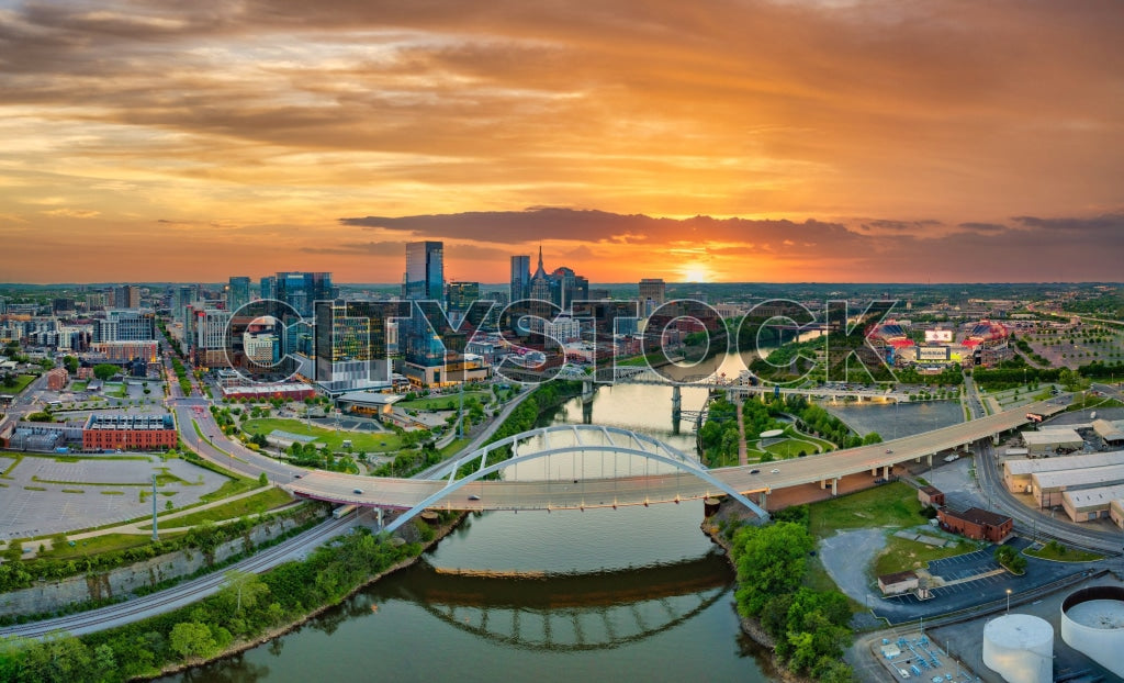 Aerial view of Nashville skyline and river at sunset