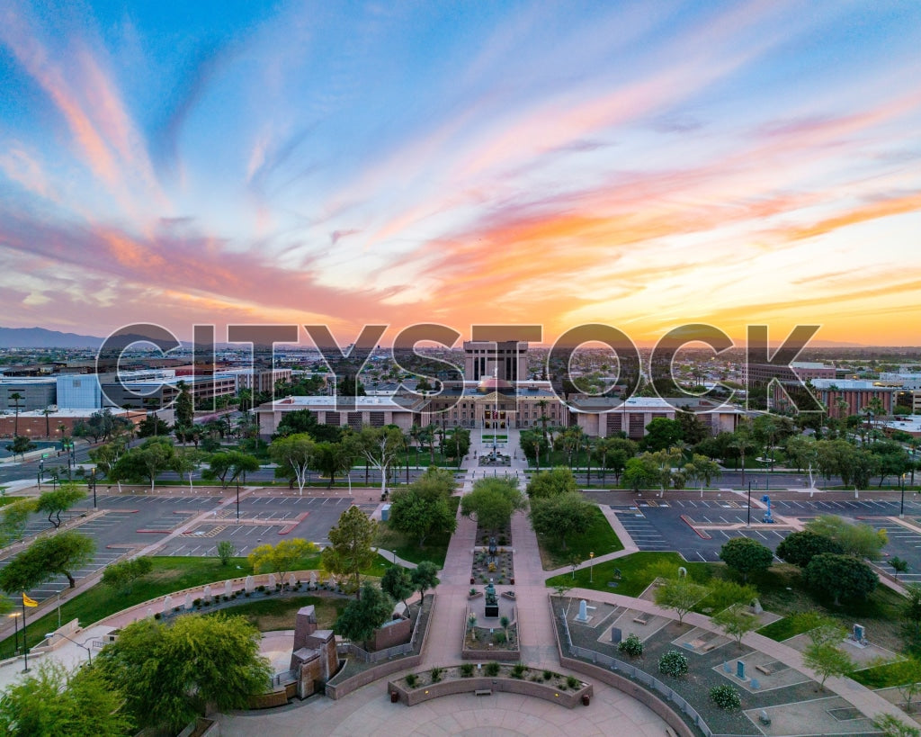 Aerial sunrise view of downtown Phoenix, showcasing vibrant skies and urban layout