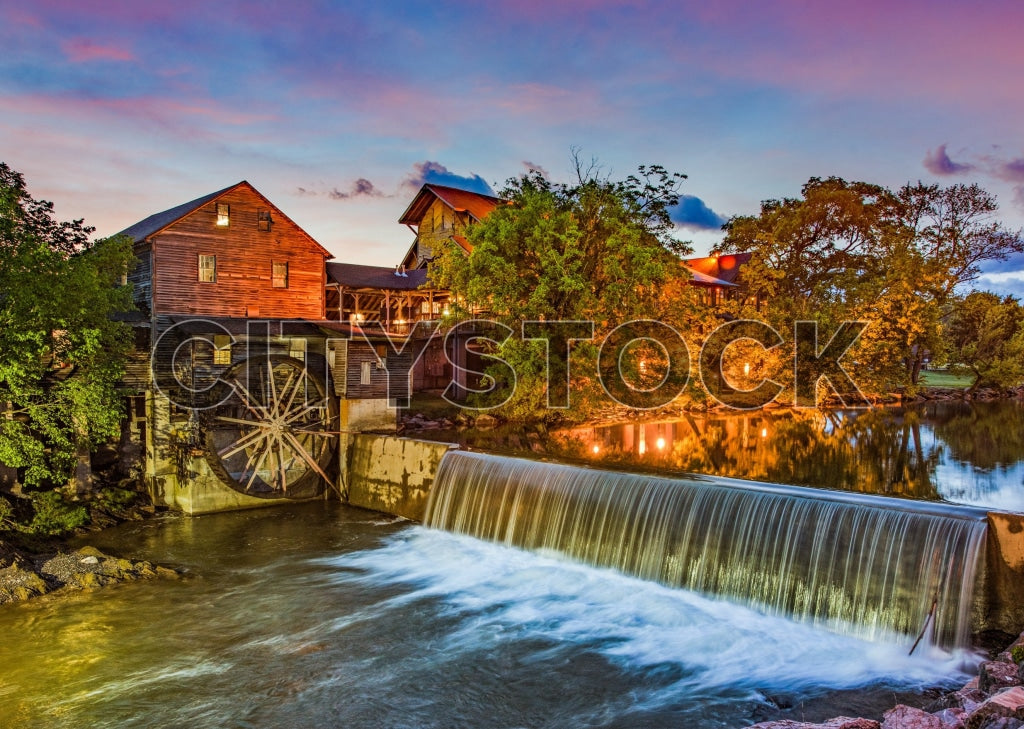 Historic Tennessee Water Mill at Sunset with Waterfall