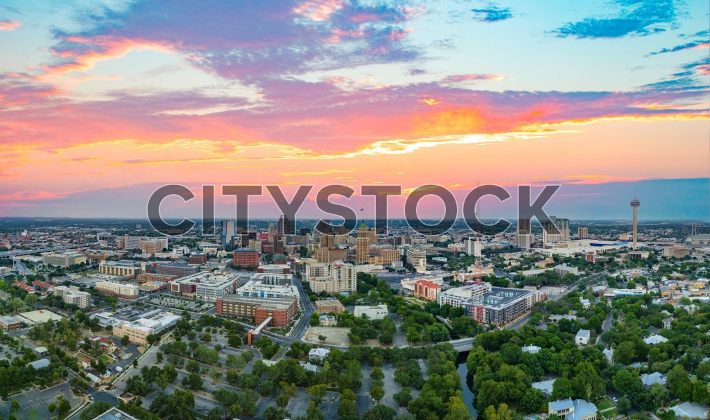 Aerial view of San Antonio, Texas skyline at sunrise with colorful clouds