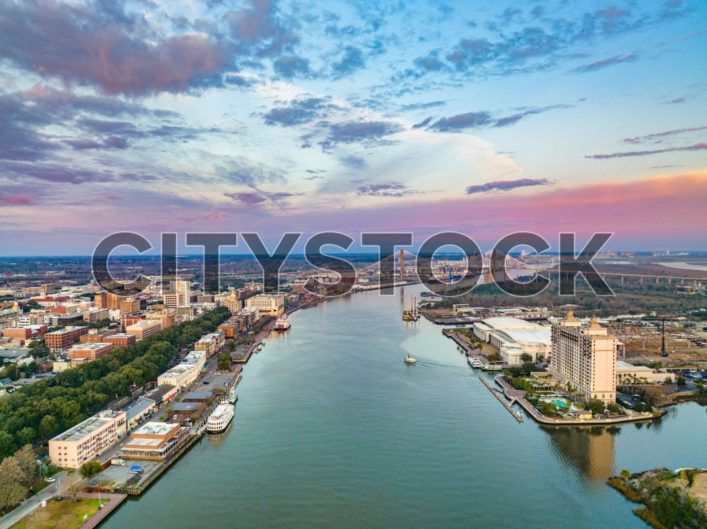 Aerial sunrise view of Savannah River weaving through Savannah GA